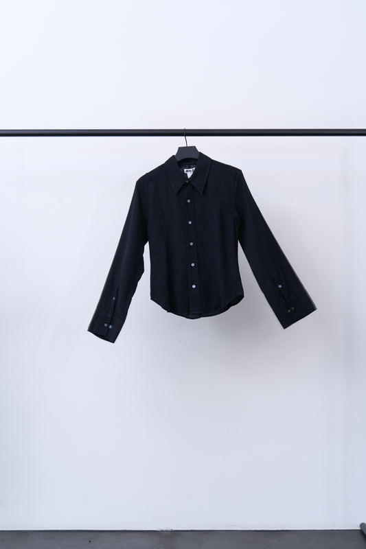 SHAPE SHIRT displayed on a hanger, showcasing its stylish black design for versatile business and casual wear.