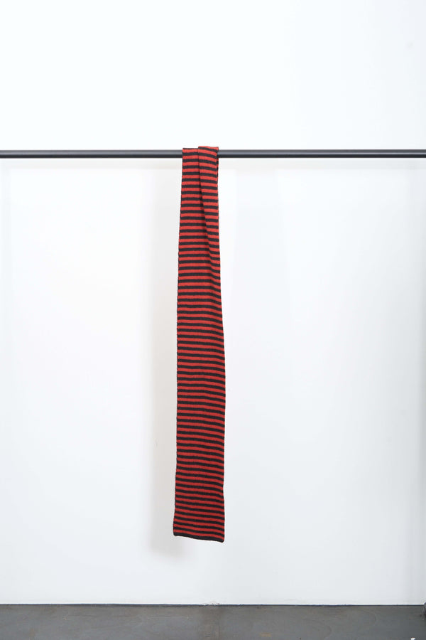 BRUSHED NARROW STRIPE SCARF hanging on a rack, featuring contrasting narrow stripes in soft lambswool.