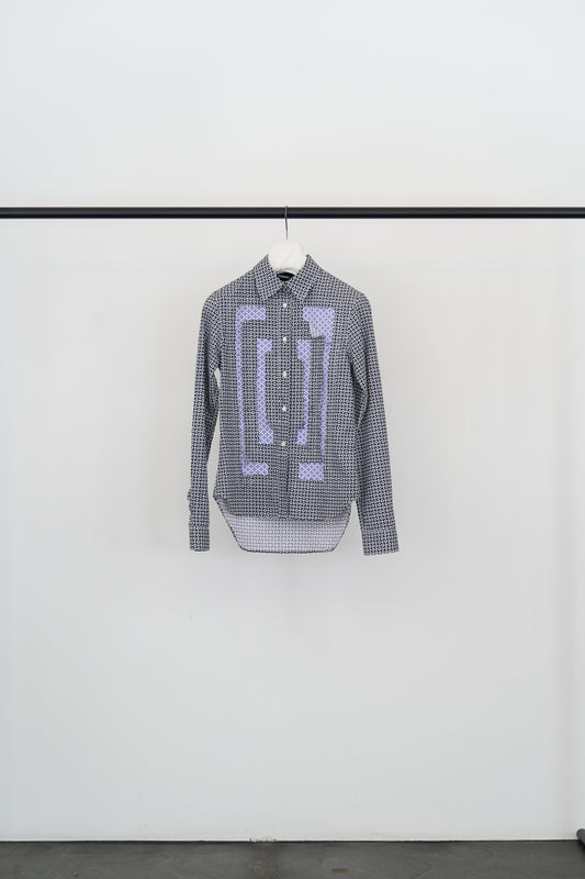 Cotton shirt by Edward Cuming with checkered flower pattern in the colors black, blue, and violet. 