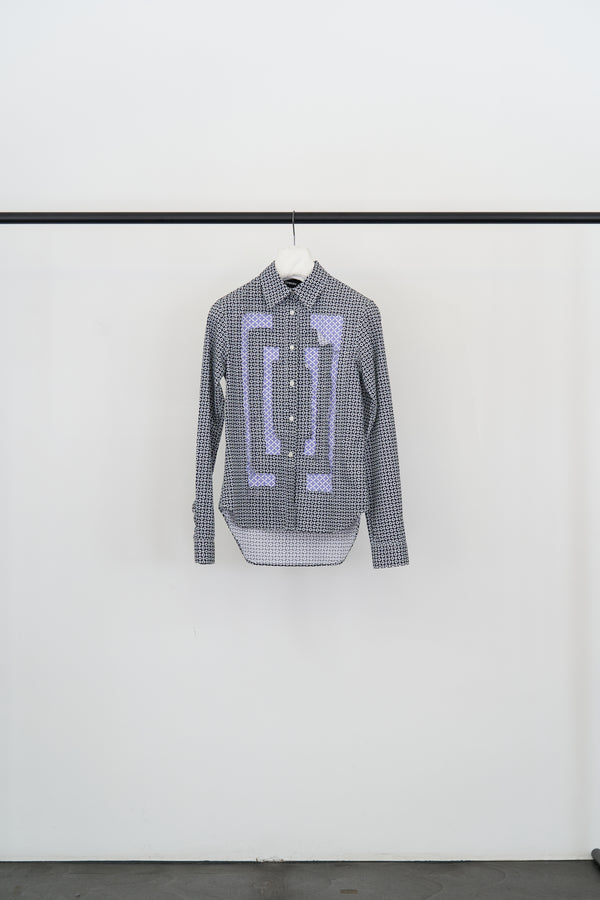 Cotton shirt by Edward Cuming with checkered flower pattern in the colors black, blue, and violet. 