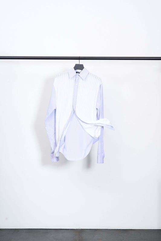KITCHEN BOXING DAY SHIRT hanging on a rack featuring white cotton front and blue jacquard design.
