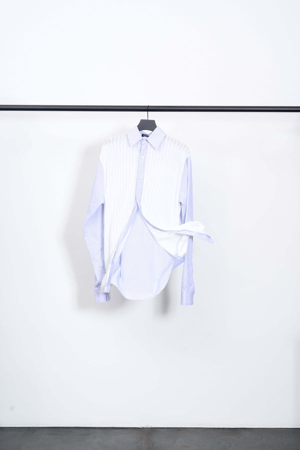 KITCHEN BOXING DAY SHIRT hanging on a rack featuring white cotton front and blue jacquard design.