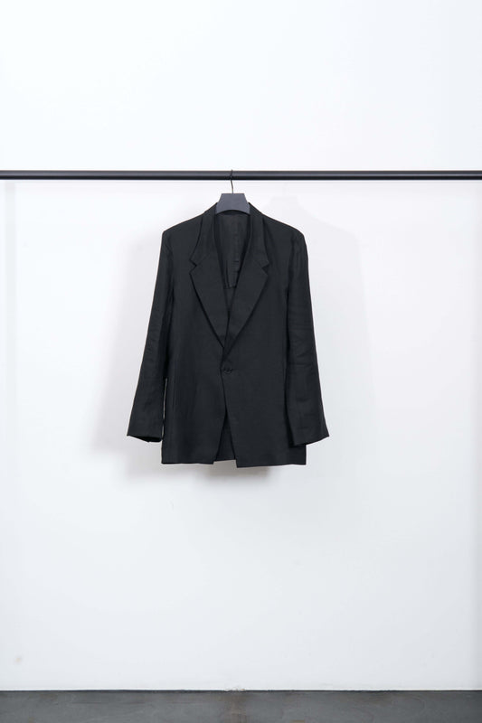 Black LINEN TAILORED JACKET with large lapels and single-button closure, ideal for business and art gallery settings.