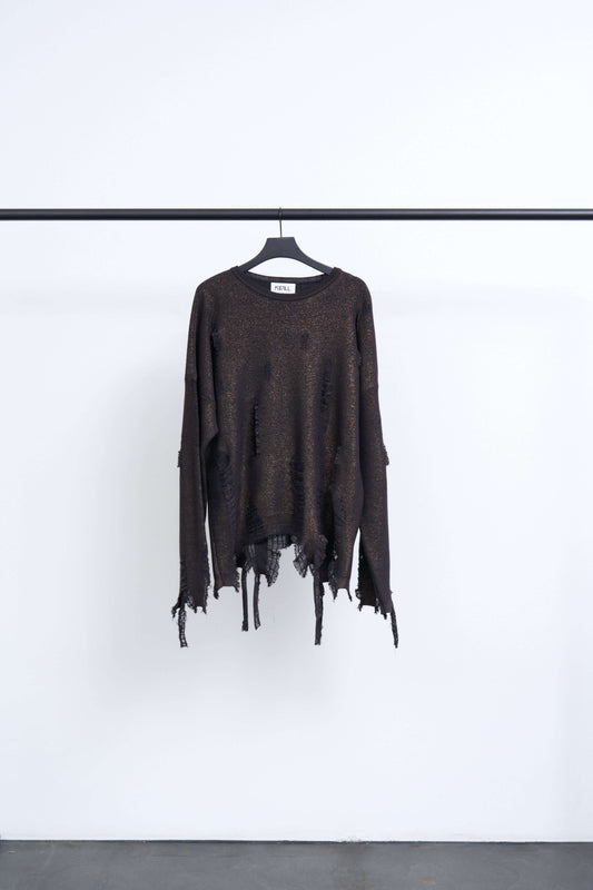DESTROY PULLOVER in distressed knitwear design, showcasing a damaged texture with metallic sheen.