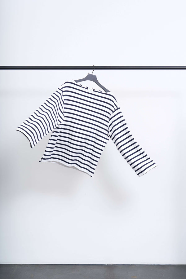 COTTON MARINER TOP hanging on a rack, showcasing its striped design and wide neckline.