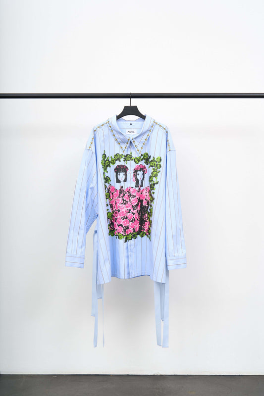 GIRLS SHIRT in blue striped cotton with graphic print, featuring long silhouette and side slits.