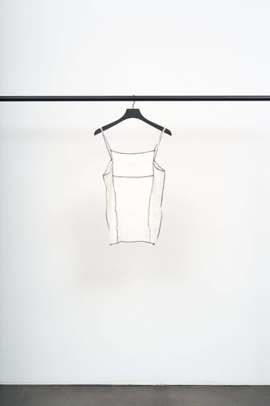 SHOK SQUARE TOP lightweight crinkled linen blend top with black contrast stitching hanging on a black hanger.